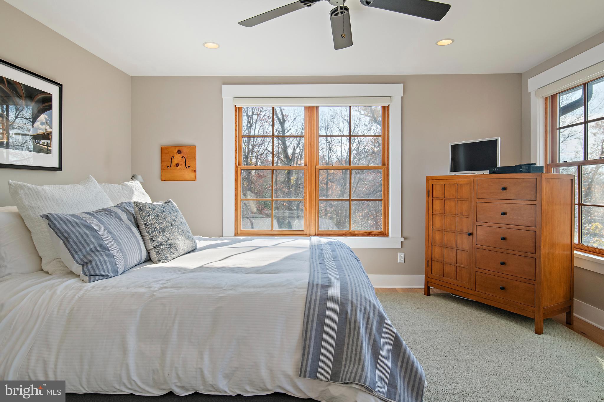 397 Forelands Road Annapolis, MD 21401 - Photo 45 of 83 a spacious bedroom with a bed and a dresser