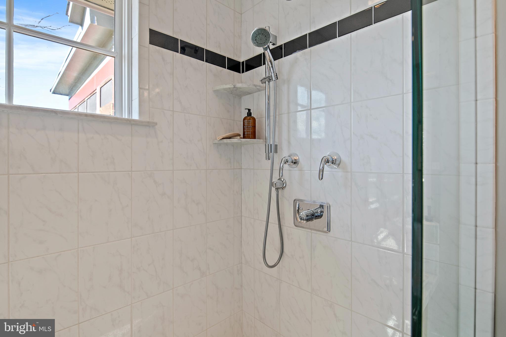 397 Forelands Road Annapolis, MD 21401 - Photo 50 of 83 a bathroom with a shower and a window