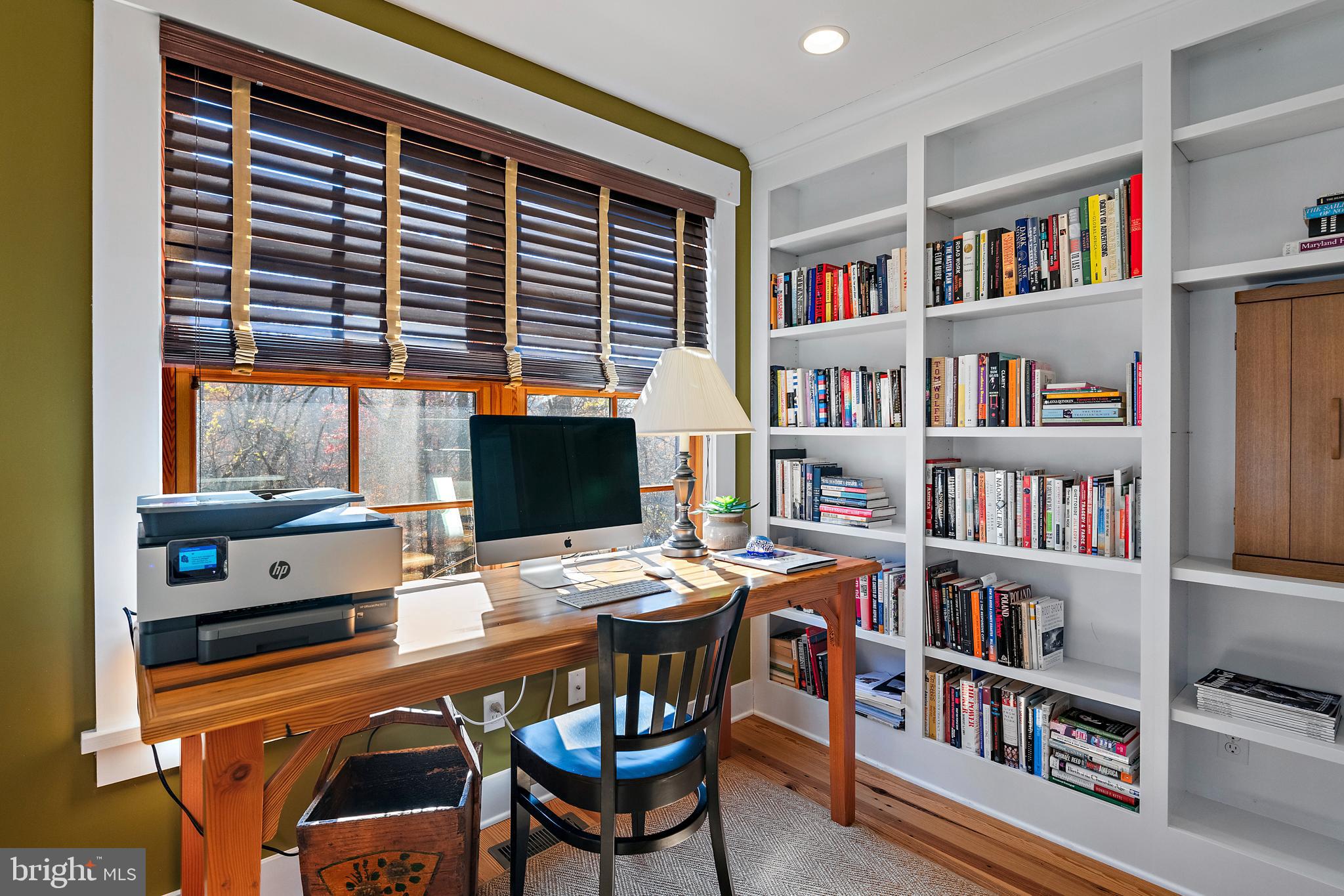 397 Forelands Road Annapolis, MD 21401 - Photo 54 of 83 a view of a workspace with furniture and a bookshelf