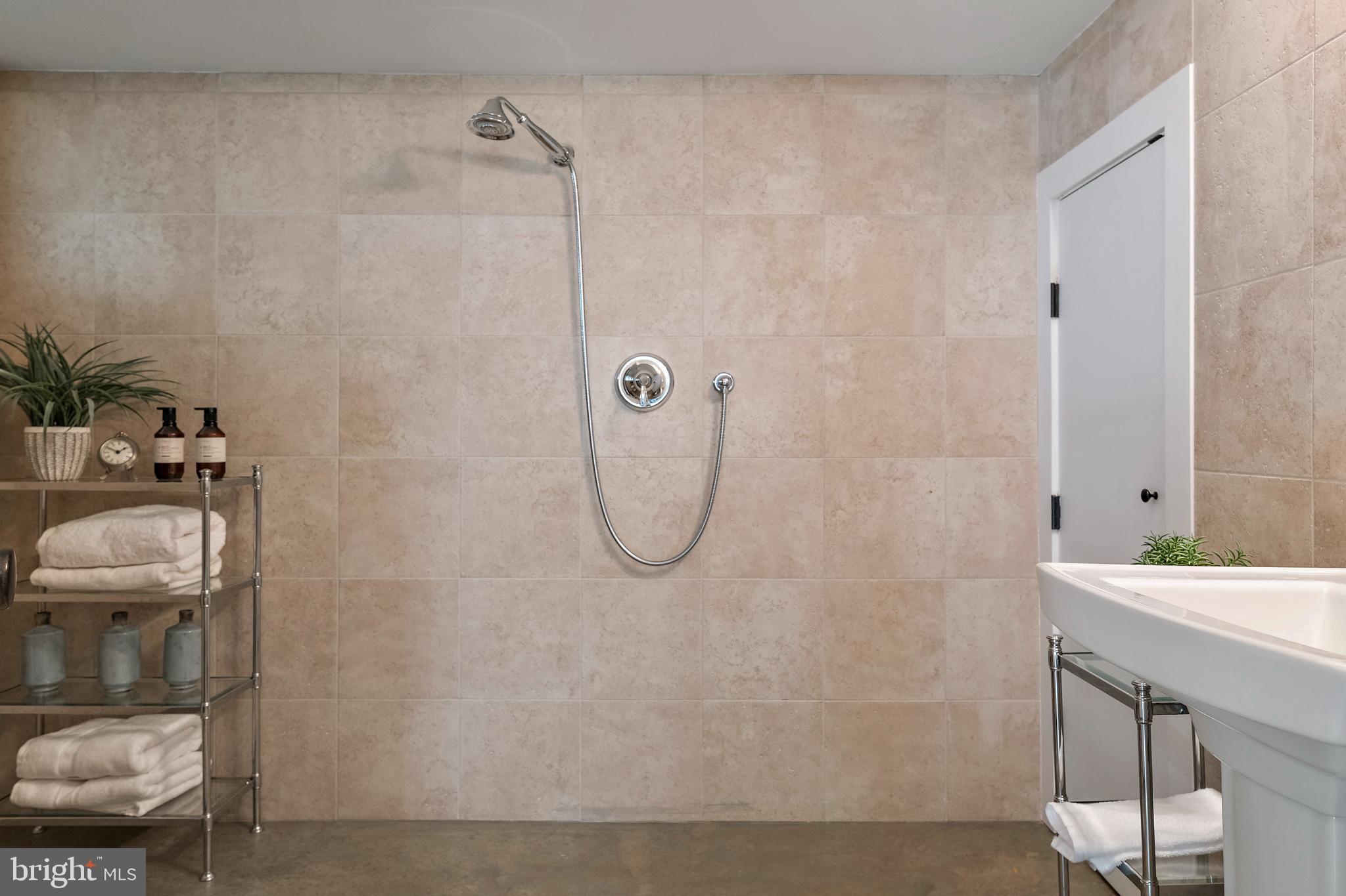397 Forelands Road Annapolis, MD 21401 - Photo 62 of 83 a bathroom with a sink a toilet and shower