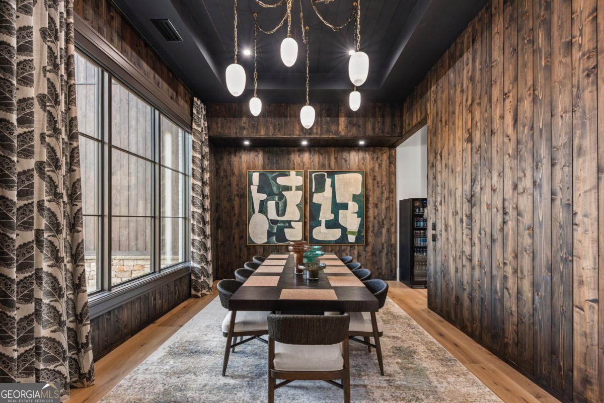 1131 Neary Ridge Greensboro, GA 30642 - Photo 11 of 72 a view of a dining room with furniture window and wooden floor