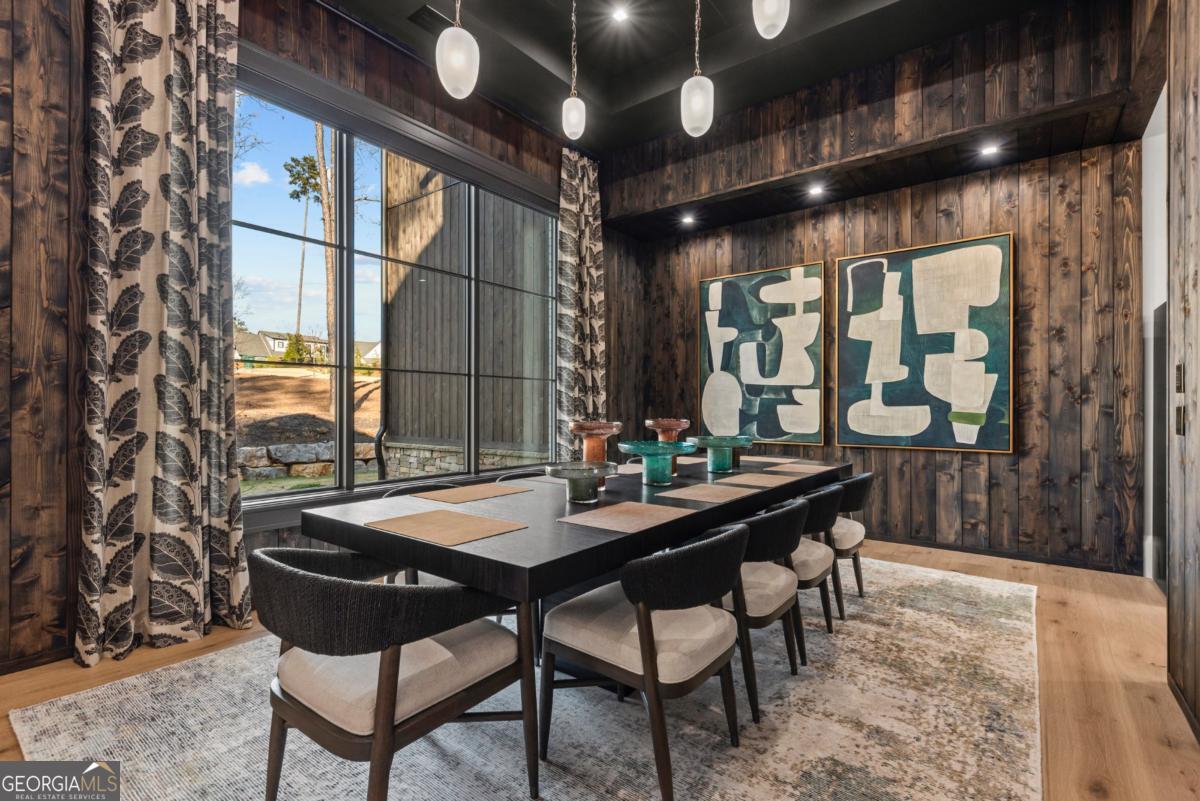 1131 Neary Ridge Greensboro, GA 30642 - Photo 12 of 72 a view of a dining room with furniture and chandelier