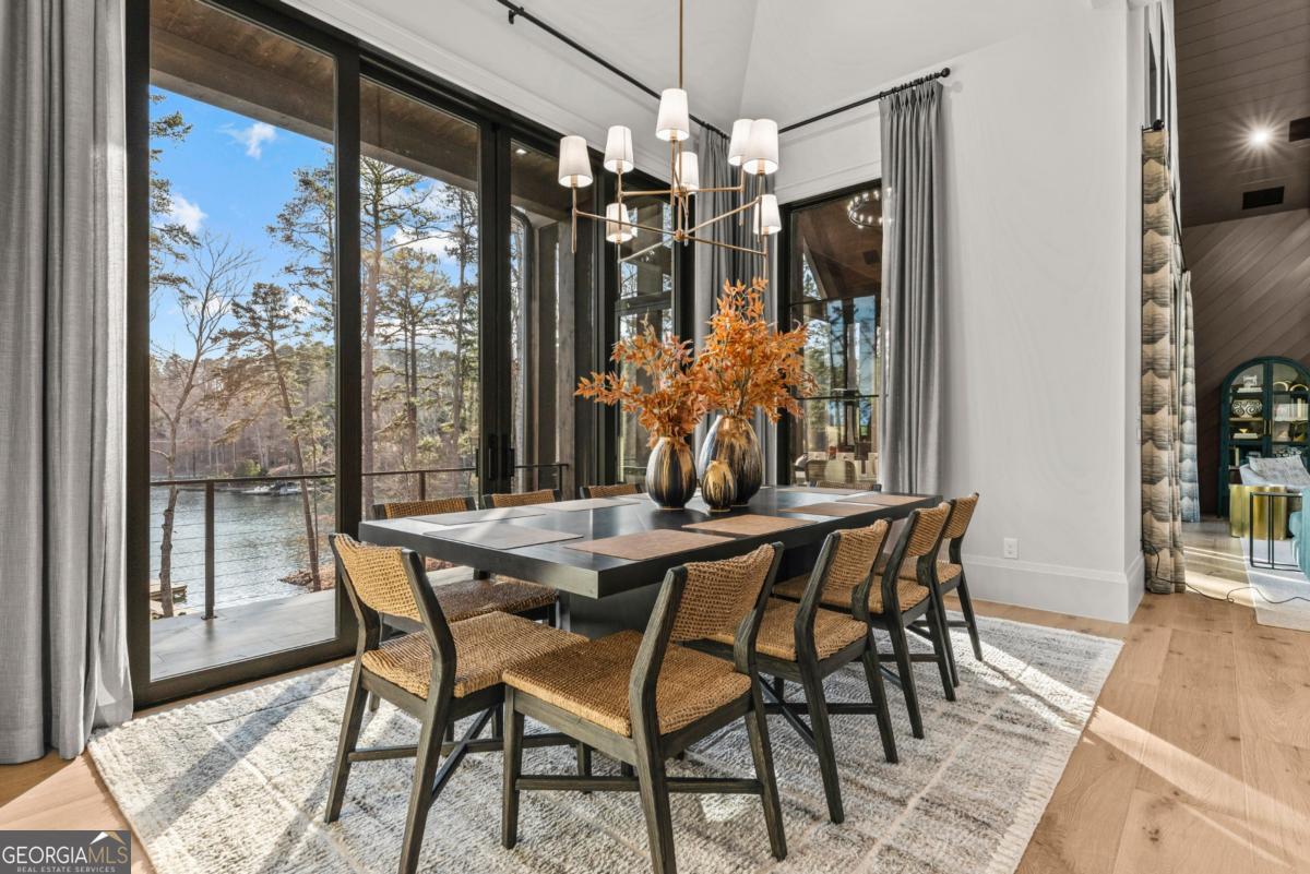 1131 Neary Ridge Greensboro, GA 30642 - Photo 18 of 72 a dining room with furniture and window