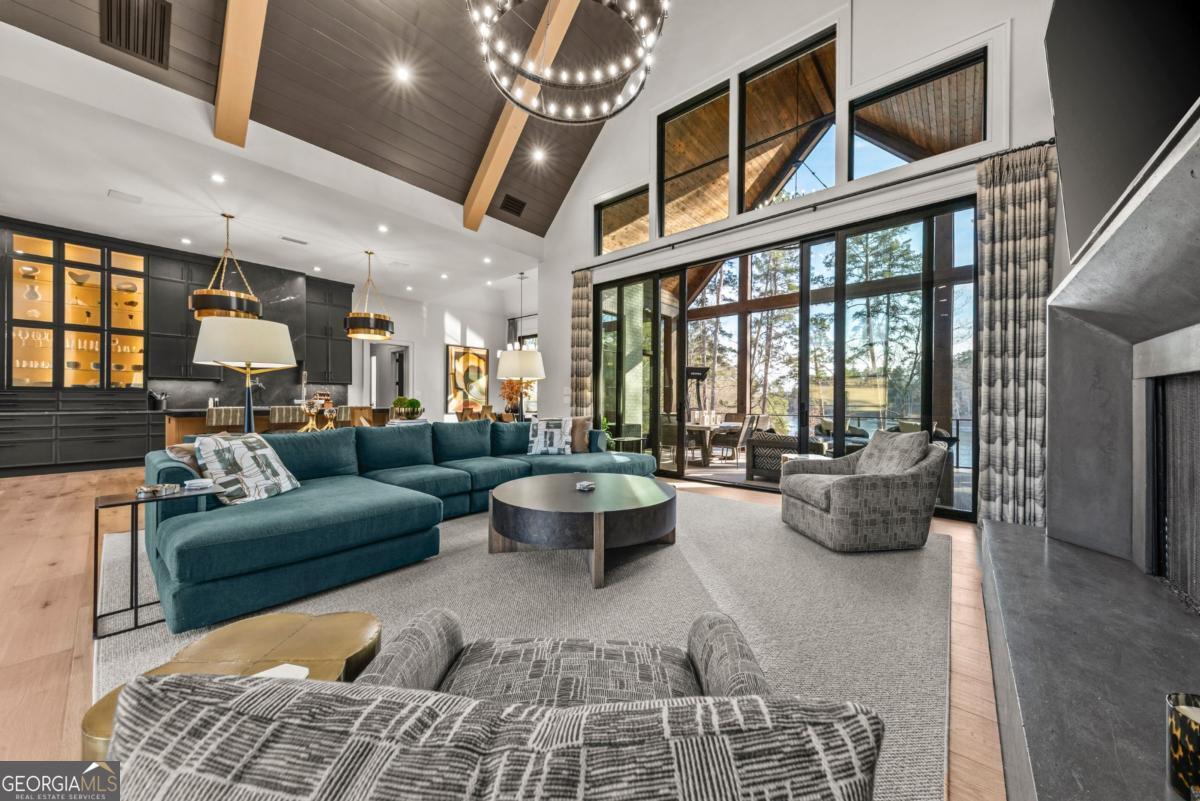 1131 Neary Ridge Greensboro, GA 30642 - Photo 22 of 72 a living room with furniture and a large window