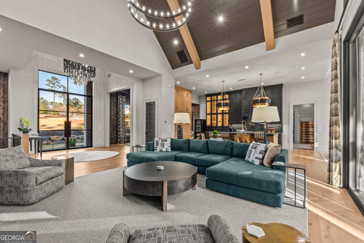 1131 Neary Ridge Greensboro, GA 30642 - Photo 23 of 72 a living room with furniture and a large window