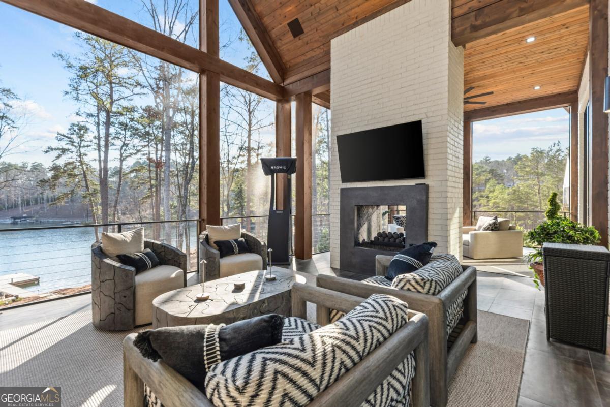 1131 Neary Ridge Greensboro, GA 30642 - Photo 25 of 72 a living room with furniture and a large window