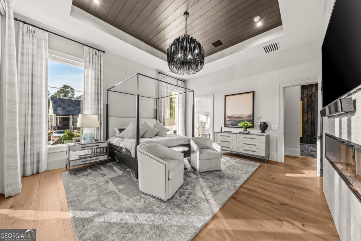 1131 Neary Ridge Greensboro, GA 30642 - Photo 29 of 72 a very nice looking living room with a couch and a flat screen tv