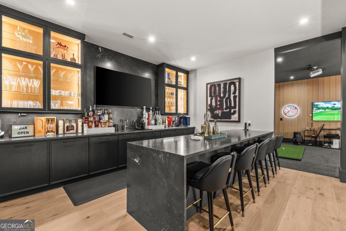 1131 Neary Ridge Greensboro, GA 30642 - Photo 42 of 72 a kitchen with granite countertop lots of counter top space and dining table