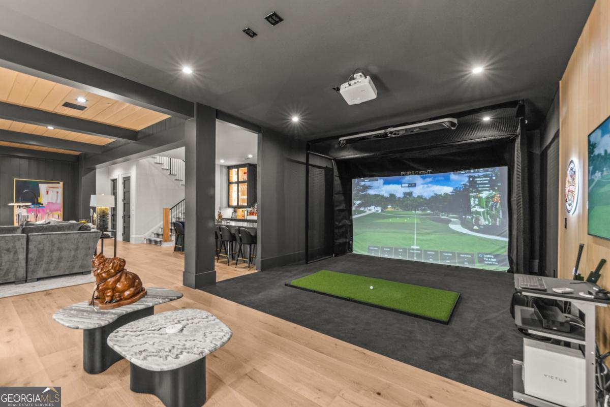 1131 Neary Ridge Greensboro, GA 30642 - Photo 48 of 72 a living room with patio furniture and a flat screen tv