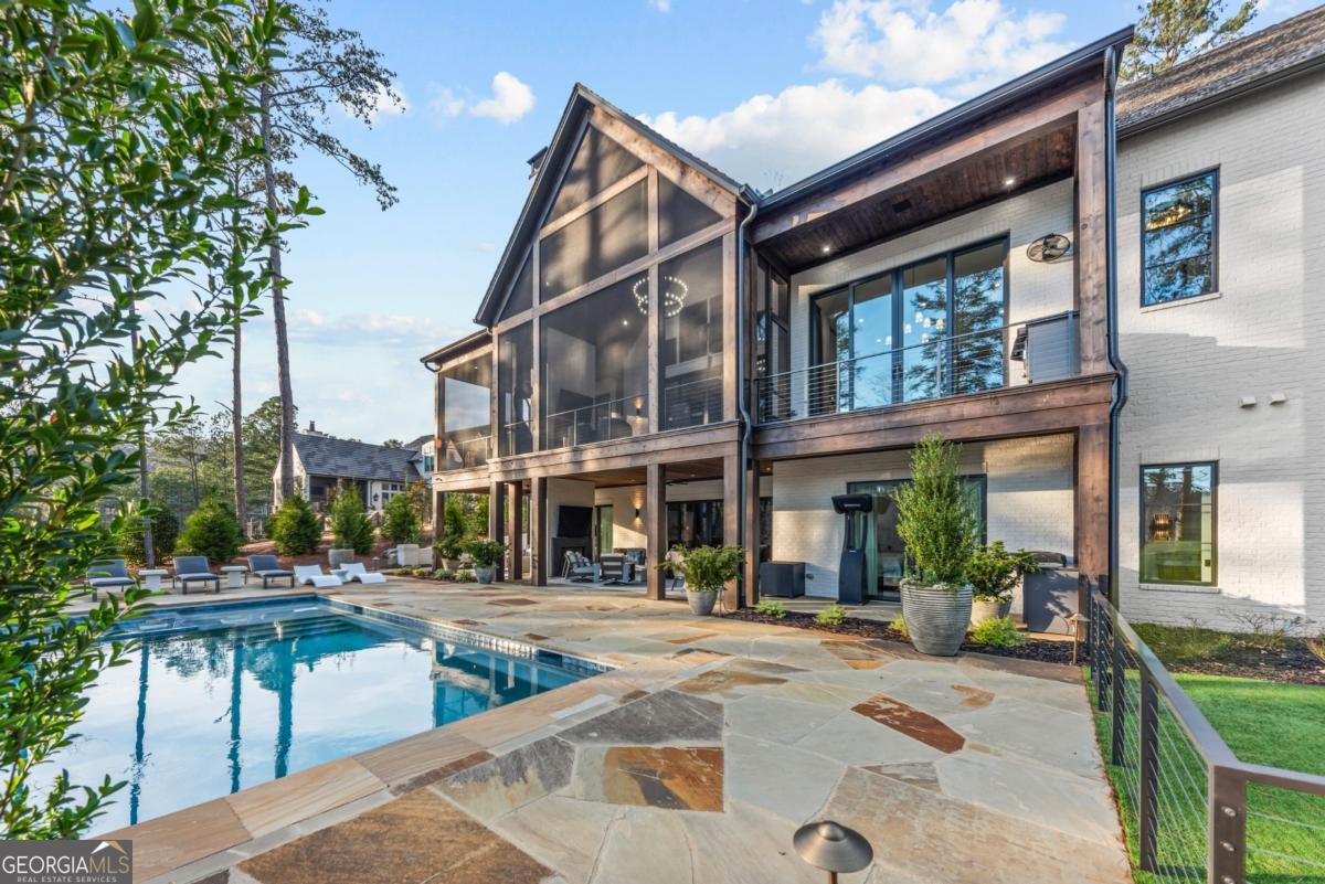 1131 Neary Ridge Greensboro, GA 30642 - Photo 67 of 72 a view of a building with a patio
