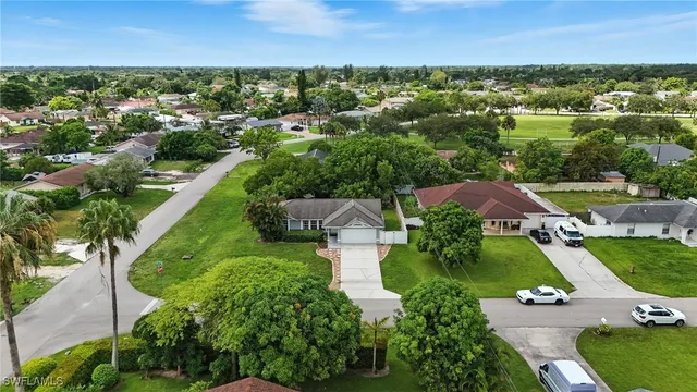 an aerial view of a house with a garden