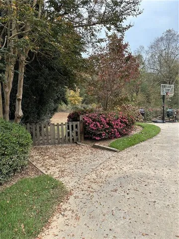 a wooden fence with some trees