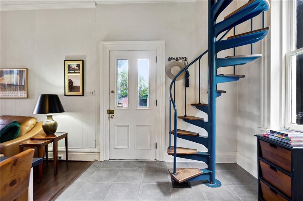 4841 Ellsworth Avenue Pittsburgh, PA 15213 - Photo 12 of 25 a view of a livingroom with furniture and staircase