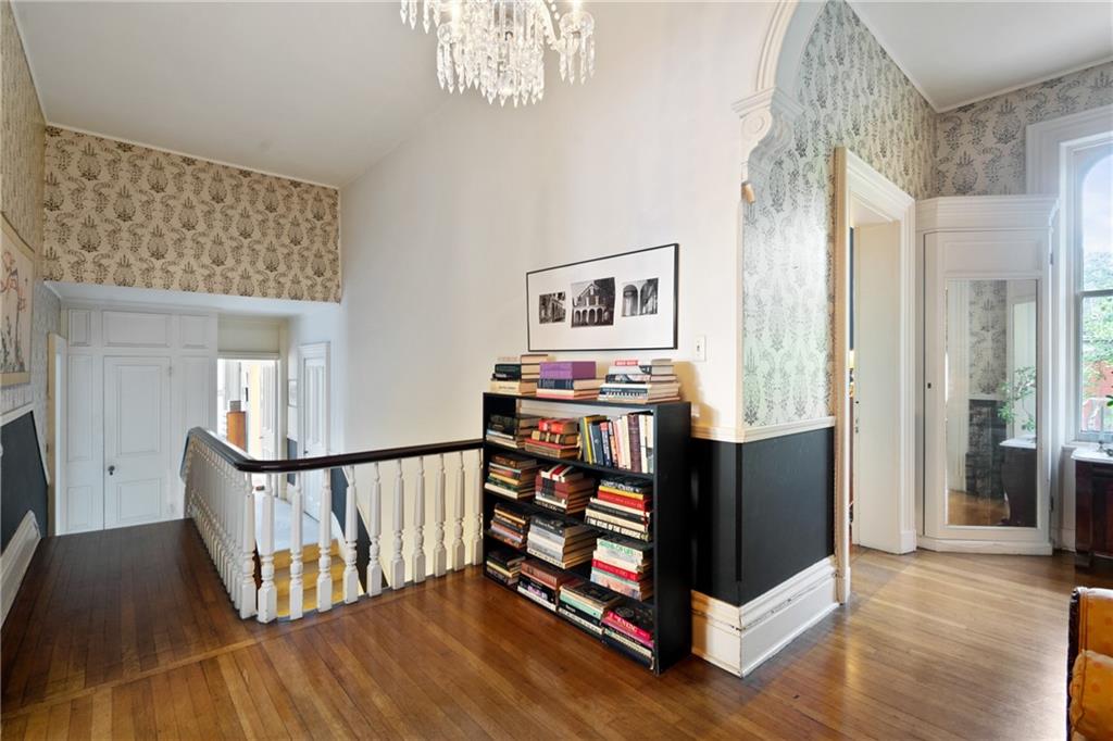 4841 Ellsworth Avenue Pittsburgh, PA 15213 - Photo 15 of 25 a view of a hallway with wooden floor and staircase