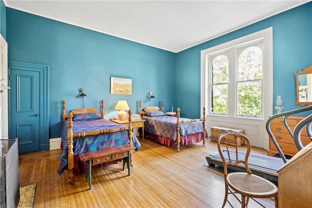 4841 Ellsworth Avenue Pittsburgh, PA 15213 - Photo 21 of 25 a room with furniture a dining table and a window