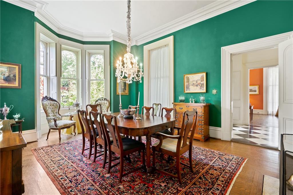 4841 Ellsworth Avenue Pittsburgh, PA 15213 - Photo 8 of 25 a view of a dining room with furniture window and wooden floor