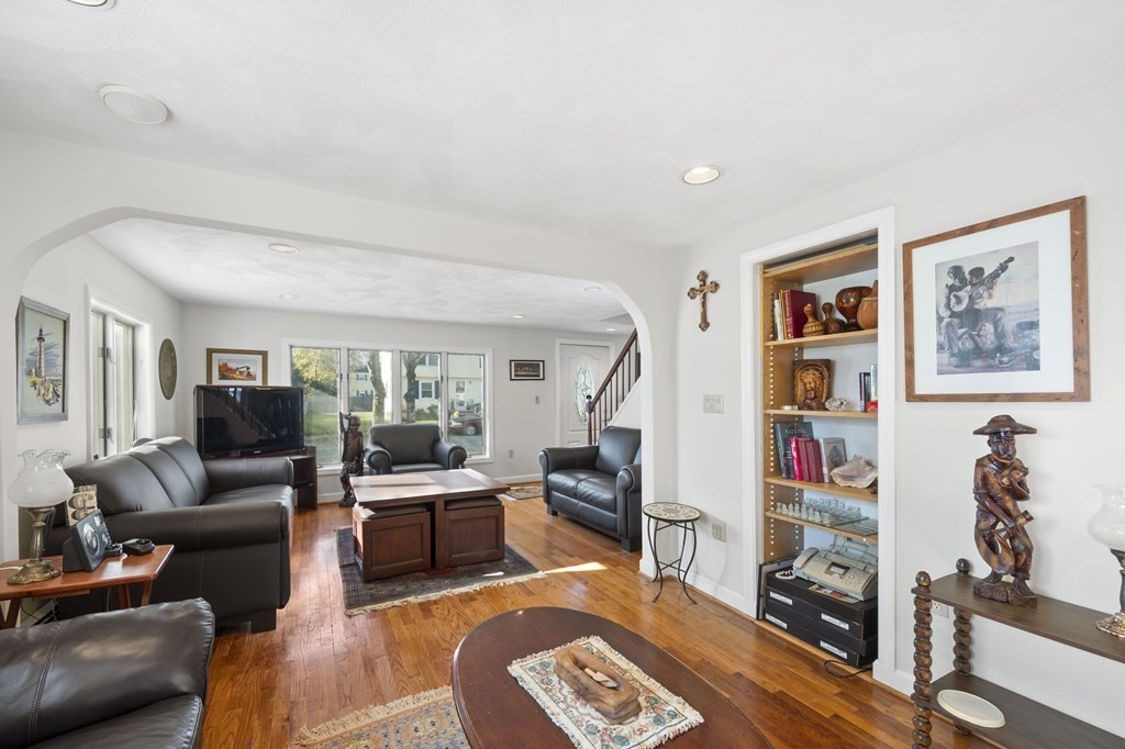 59 Proctor Circle Peabody, MA 01960 - Photo 11 of 32 a living room with furniture and a flat screen tv
