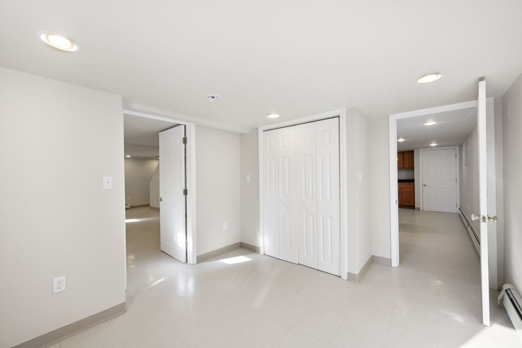 59 Proctor Circle Peabody, MA 01960 - Photo 27 of 32 an empty room with closet and a bathroom
