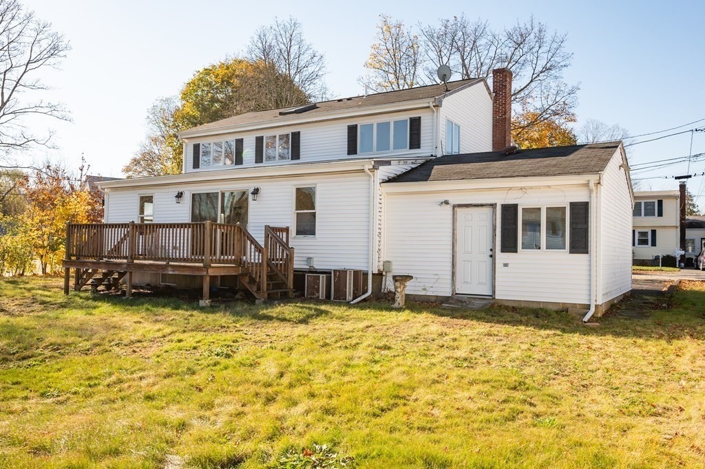 59 Proctor Circle Peabody, MA 01960 - Photo 32 of 32 a view of a house with wooden fence