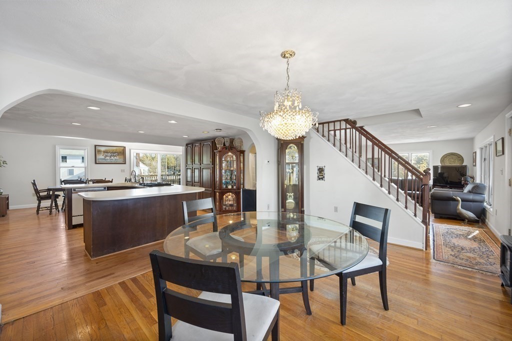 59 Proctor Circle Peabody, MA 01960 - Photo 5 of 32 a view of a dining room with furniture and wooden floor
