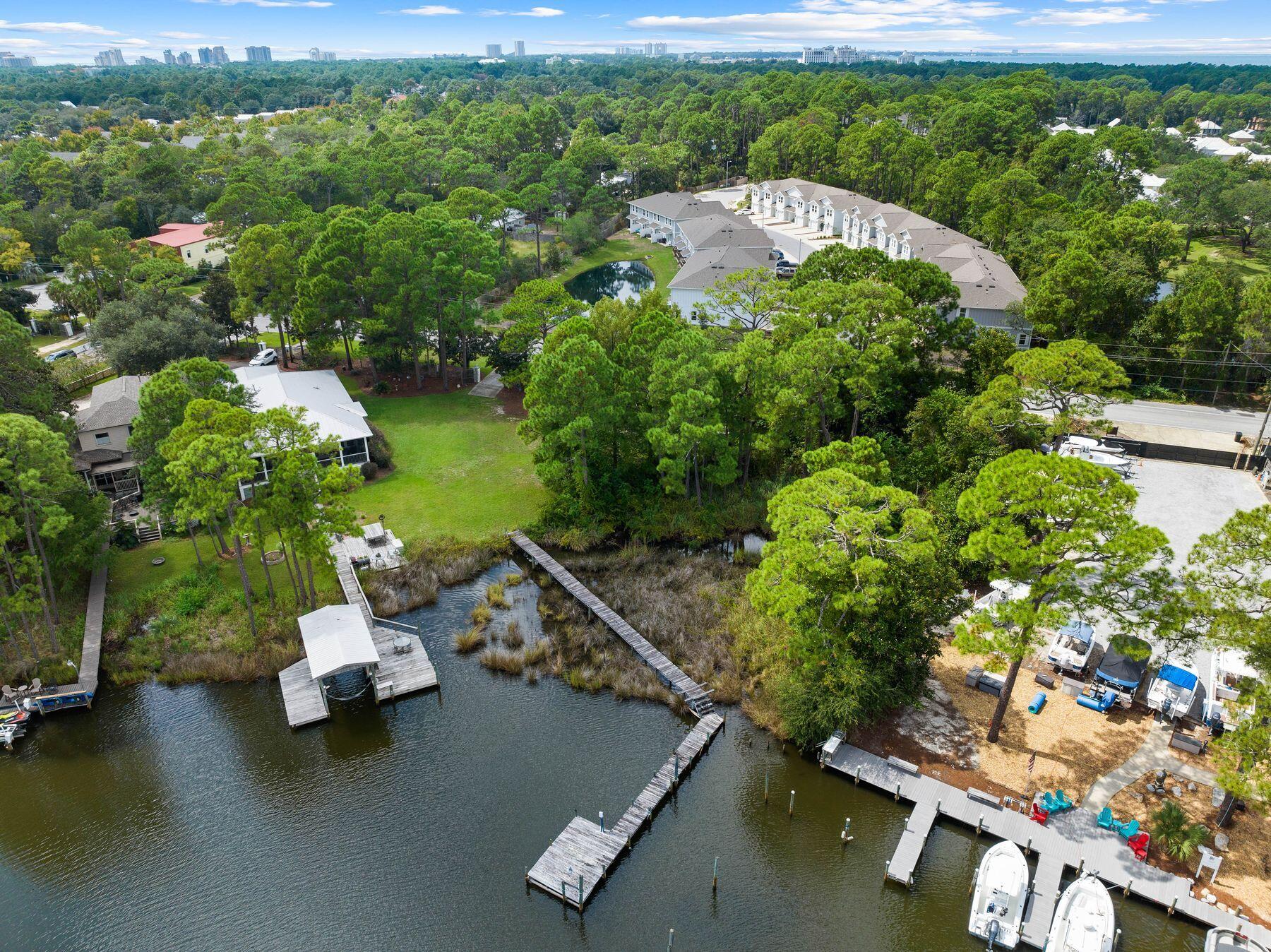1196 Mack Bayou Road Santa Rosa Beach, FL 32459 - Photo 14 of 19 a view of a swimming pool with a yard