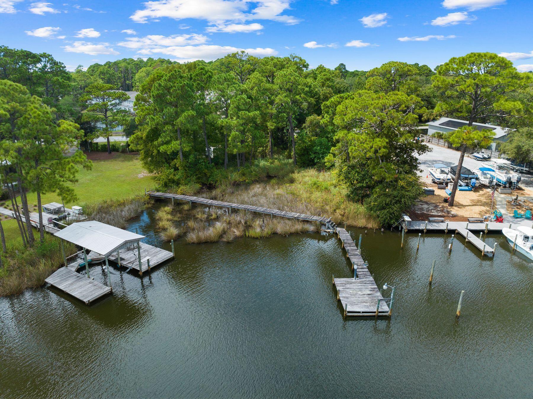 1196 Mack Bayou Road Santa Rosa Beach, FL 32459 - Photo 15 of 19 an aerial view of a house with a lake view