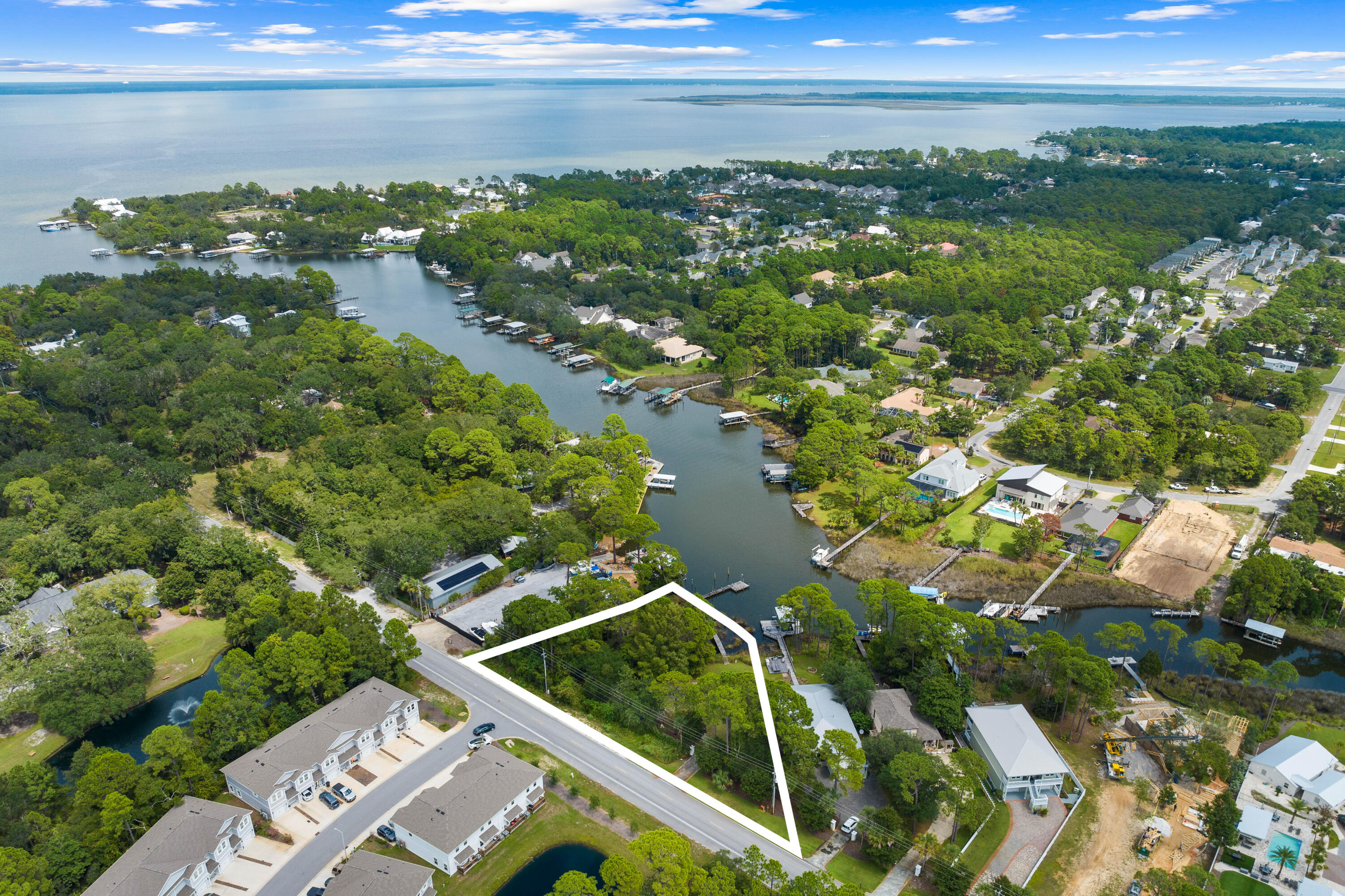 1196 Mack Bayou Road Santa Rosa Beach, FL 32459 - Photo 9 of 19 a view of a lake and mountain