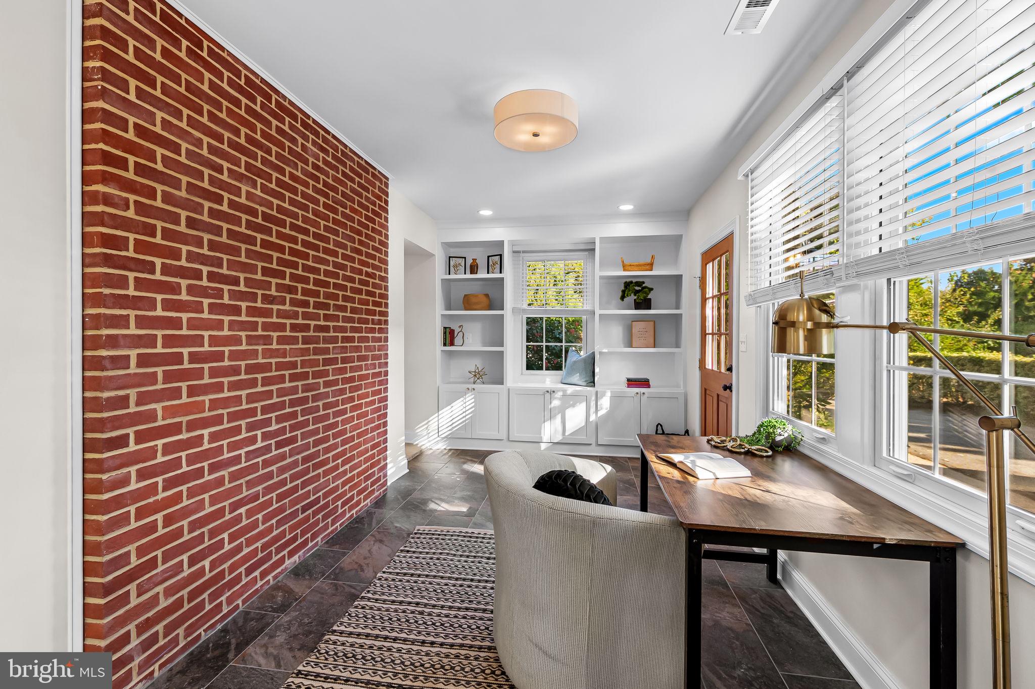 6300 Pinehurst Road Baltimore, MD 21212 - Photo 6 of 34 a dining room with furniture and large windows