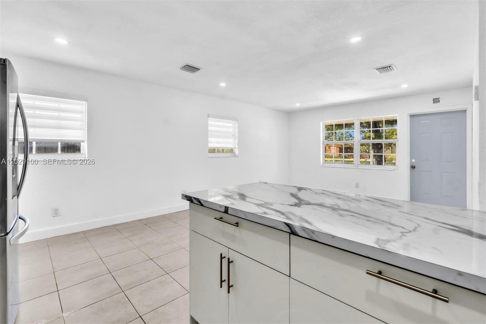 11790 Southwest 34th Street Miami, FL 33175 - Photo 12 of 56 a view of a kitchen counter space and windows