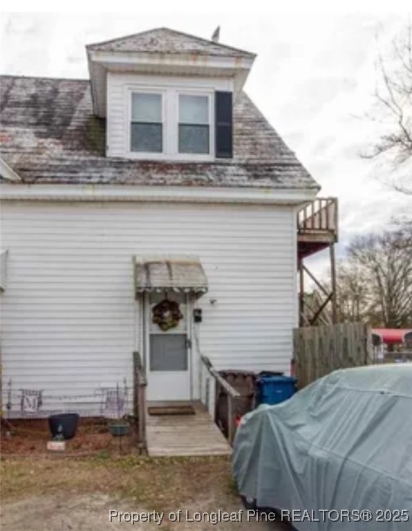 a front view of a house with garage