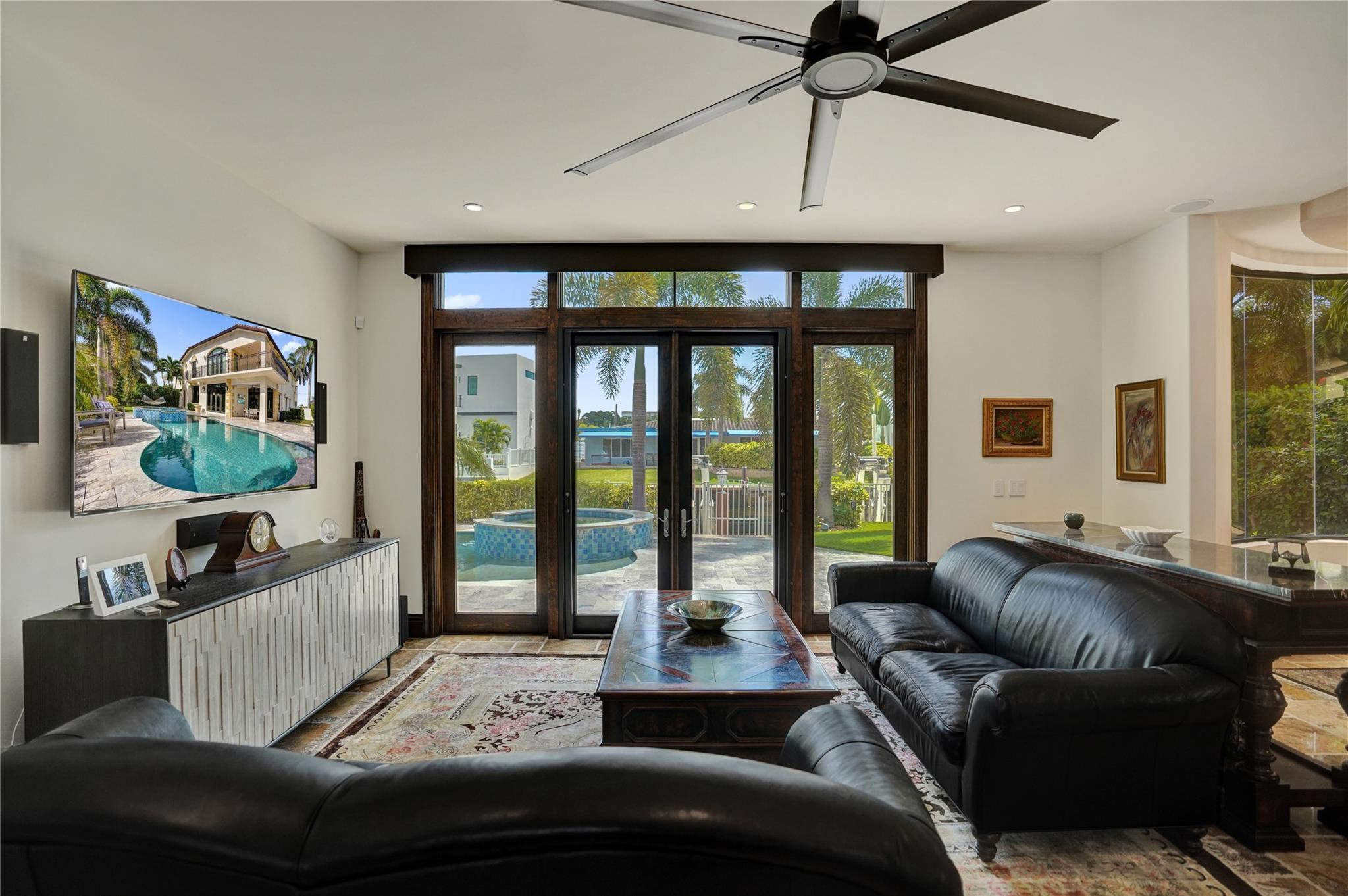 4930 Northeast 27th Terrace Lighthouse Point, FL 33064 - Photo 16 of 51 a living room with furniture and a large window