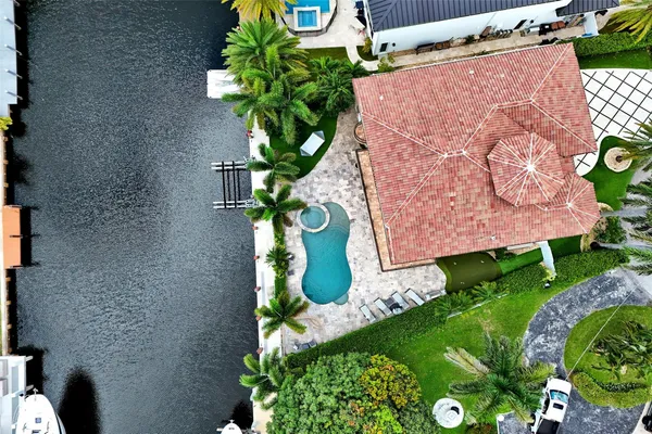 an aerial view of a house with garden