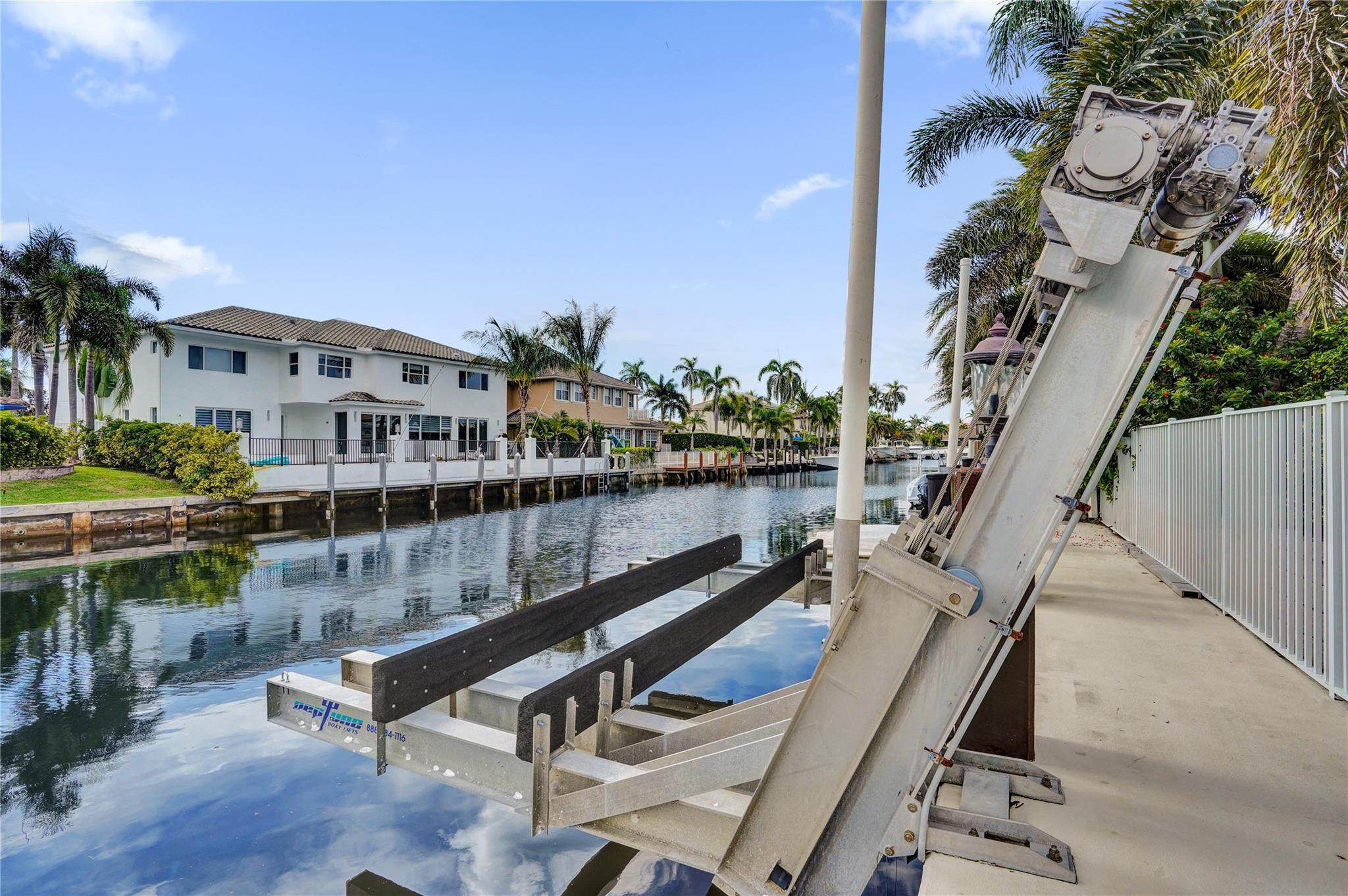 4930 Northeast 27th Terrace Lighthouse Point, FL 33064 - Photo 47 of 51 a view of swimming pool with outdoor seating and plants