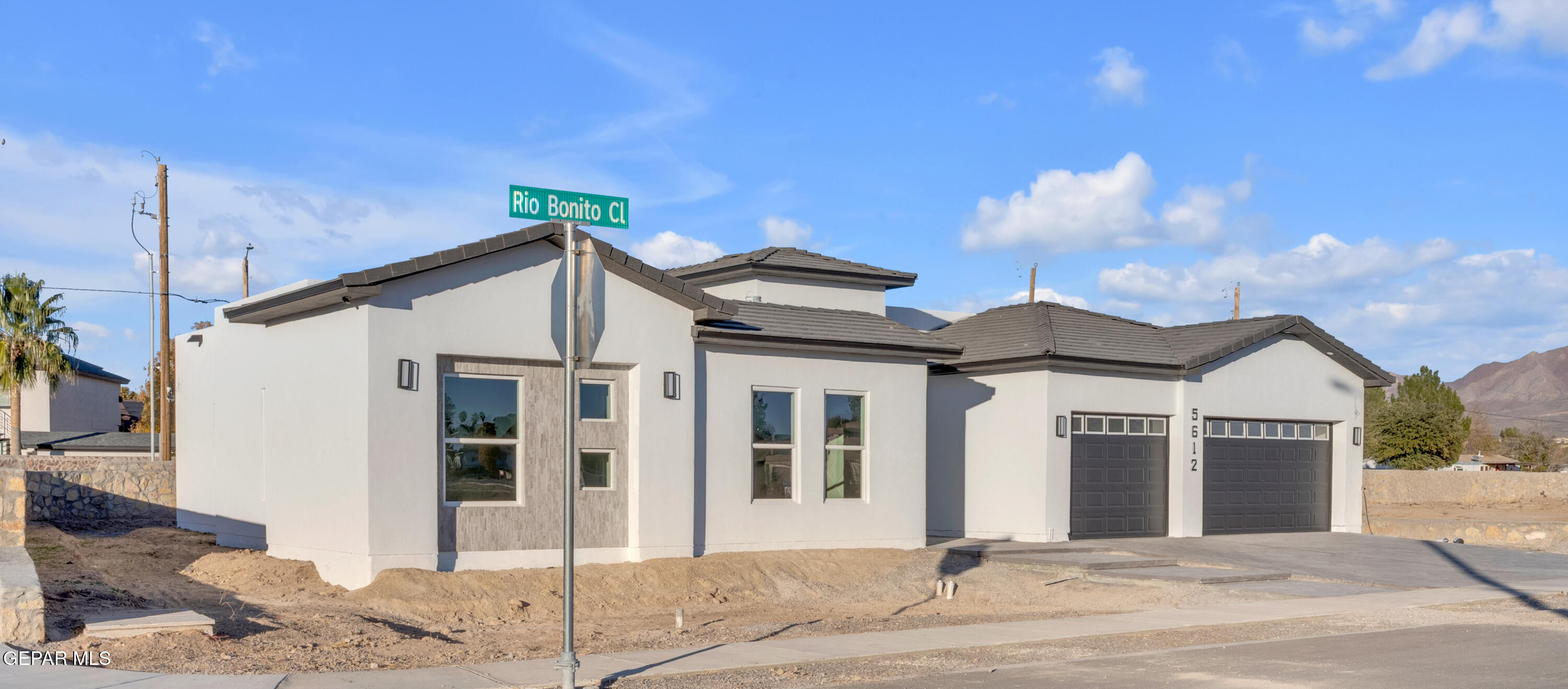 5612 Rio Bonito Circle El Paso, TX 79932 - Photo 3 of 79 a front view of a house with a yard