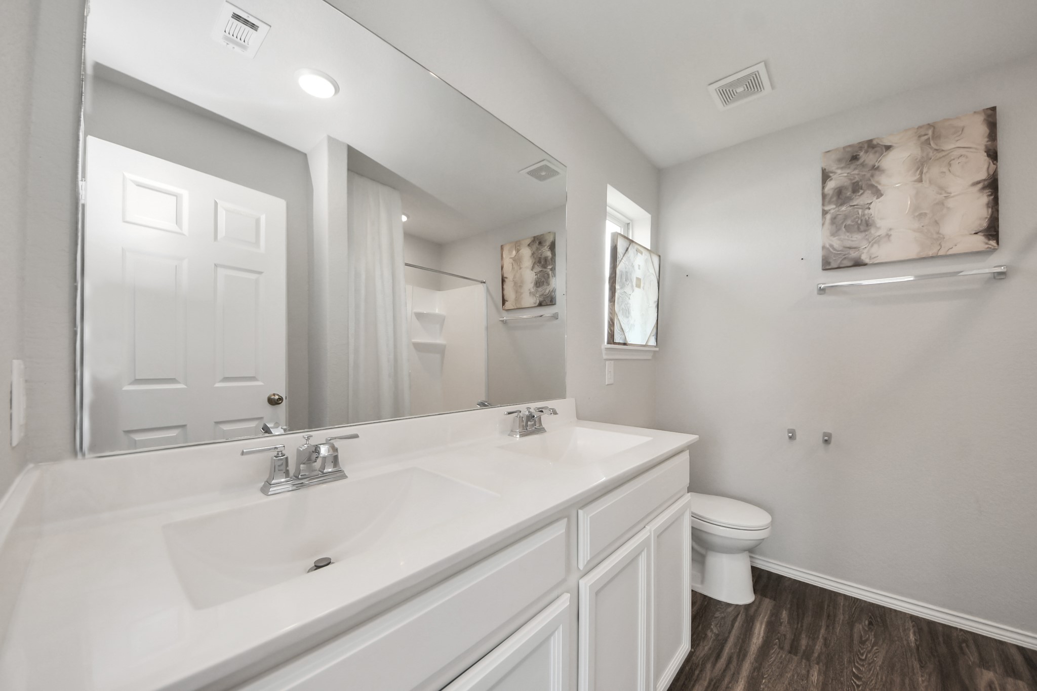 5735 Prairie Chapel Road Katy, TX 77493 - Photo 14 of 19 a bathroom with a sink and a mirror