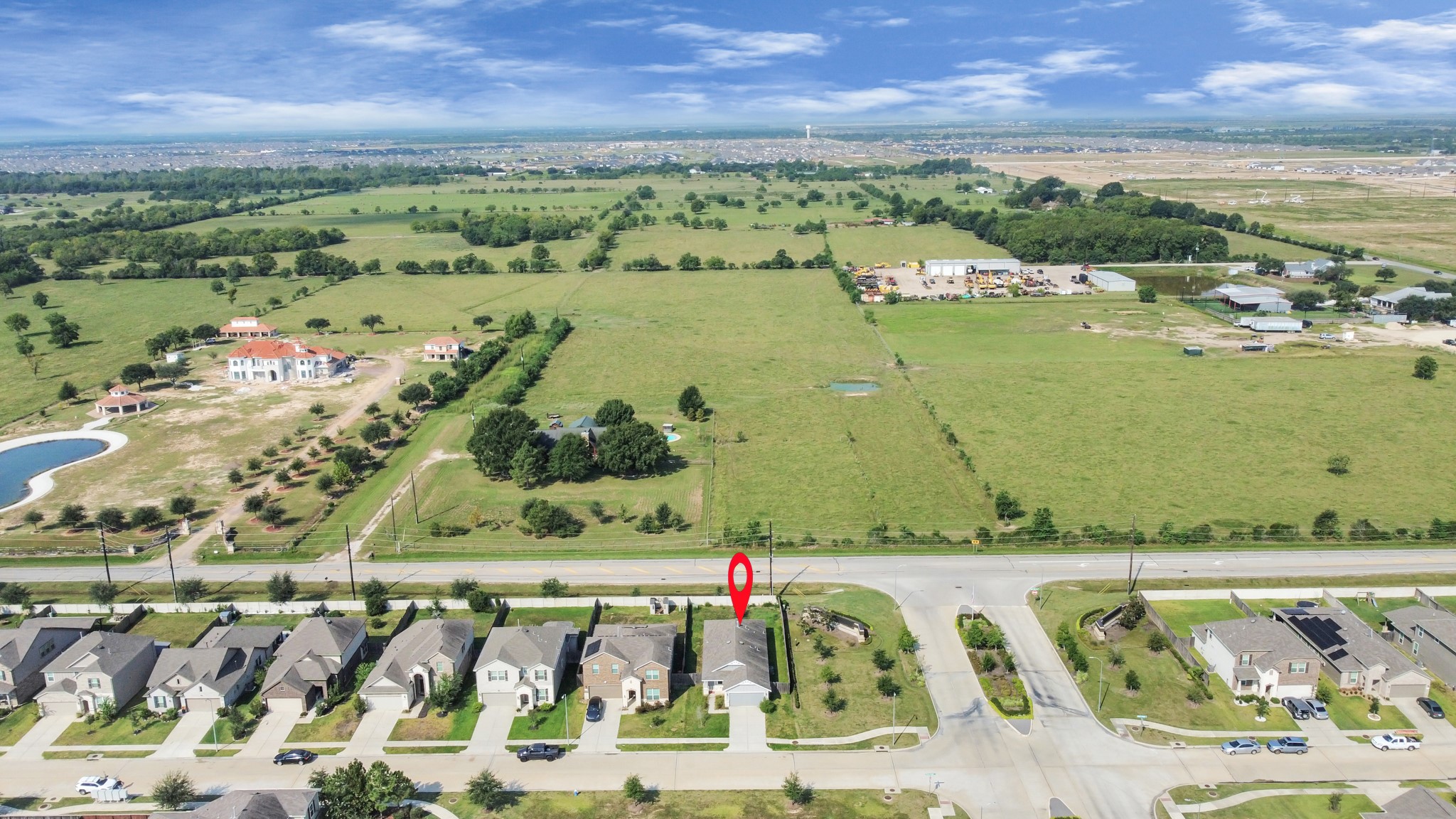 5735 Prairie Chapel Road Katy, TX 77493 - Photo 19 of 19 an aerial view of a city with lots of residential buildings ocean and mountain view