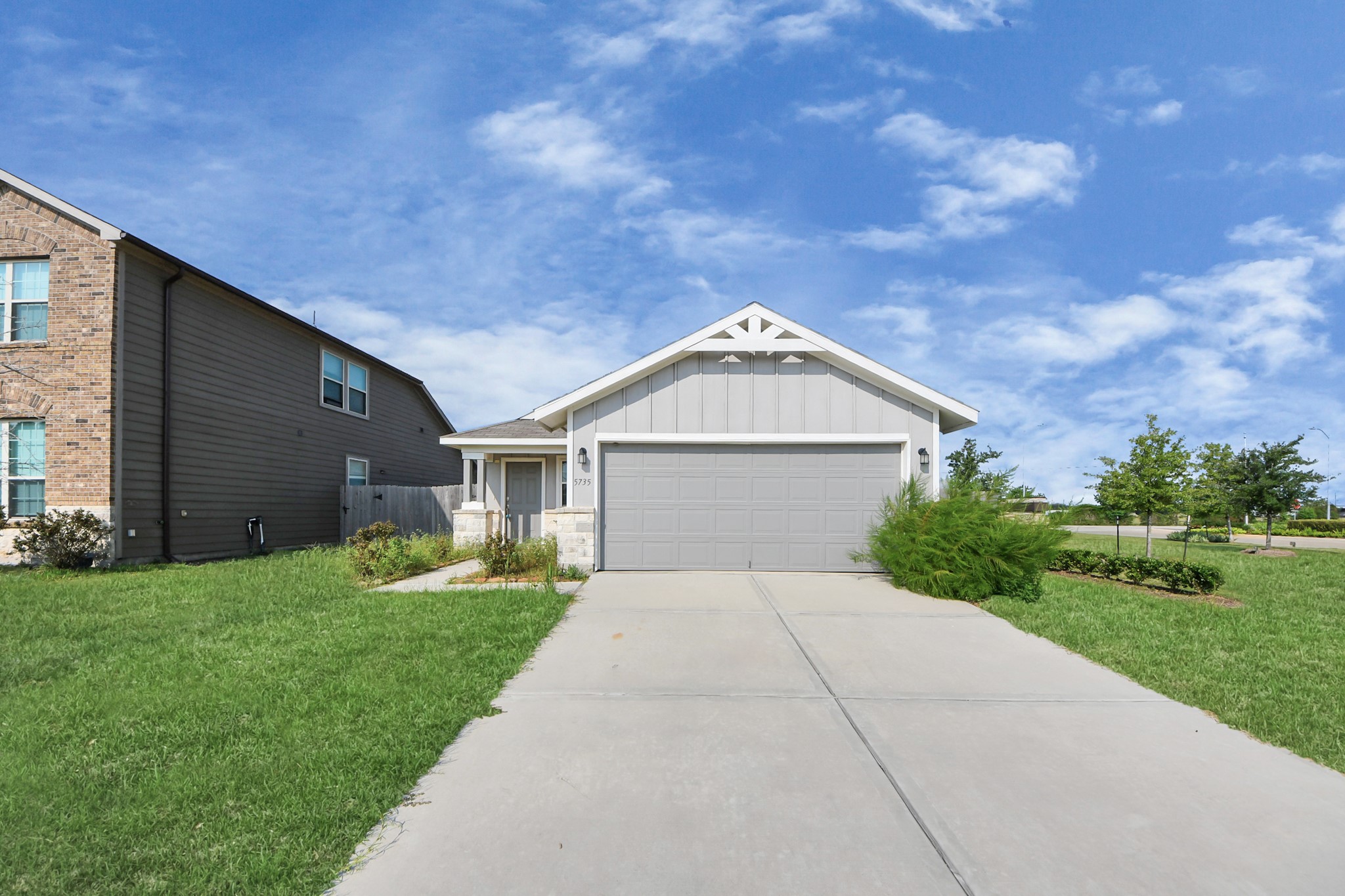 5735 Prairie Chapel Road Katy, TX 77493 - Photo 2 of 19 a front view of a house with a yard