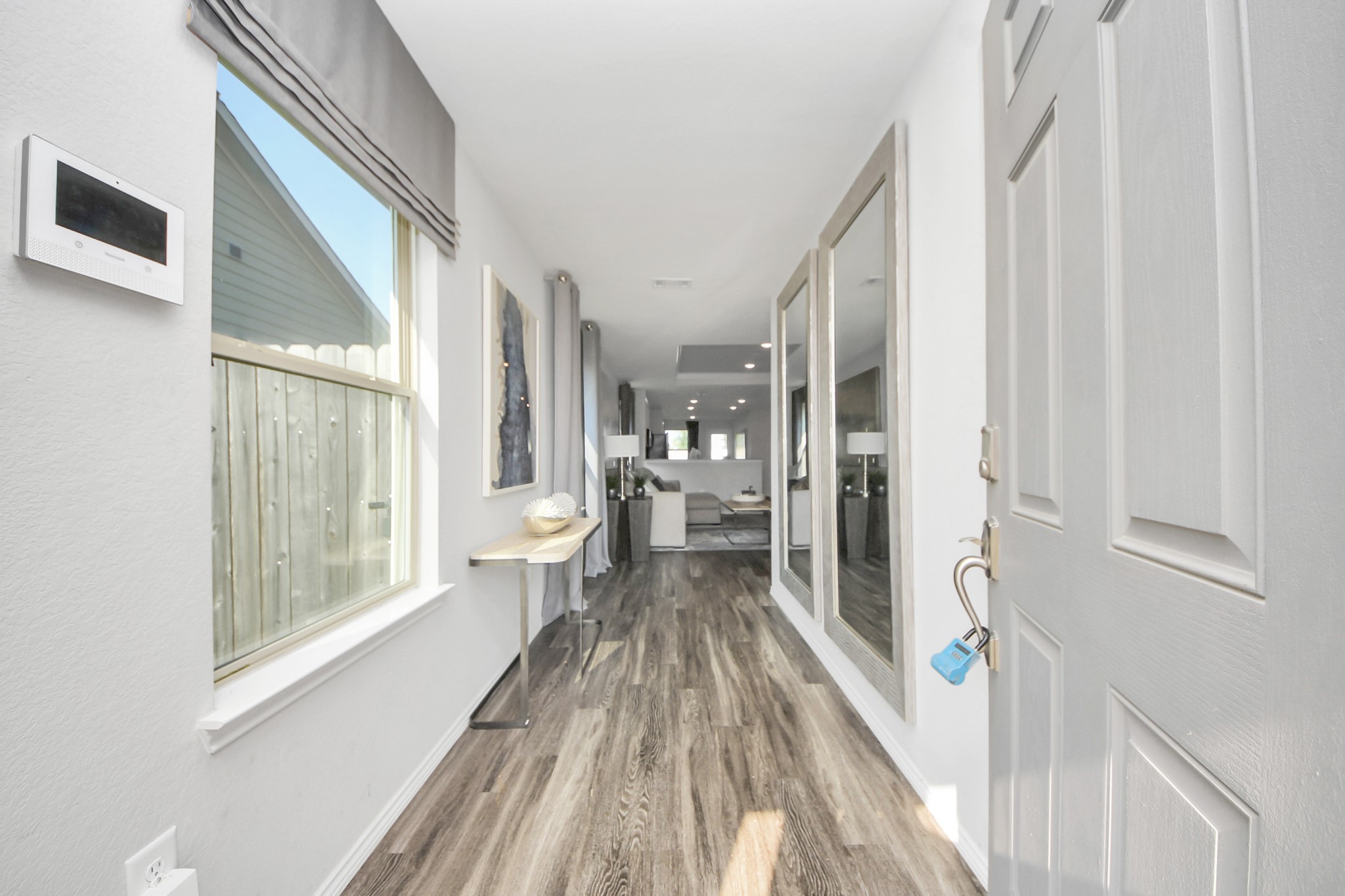 5735 Prairie Chapel Road Katy, TX 77493 - Photo 3 of 19 a view of a living room with a large window