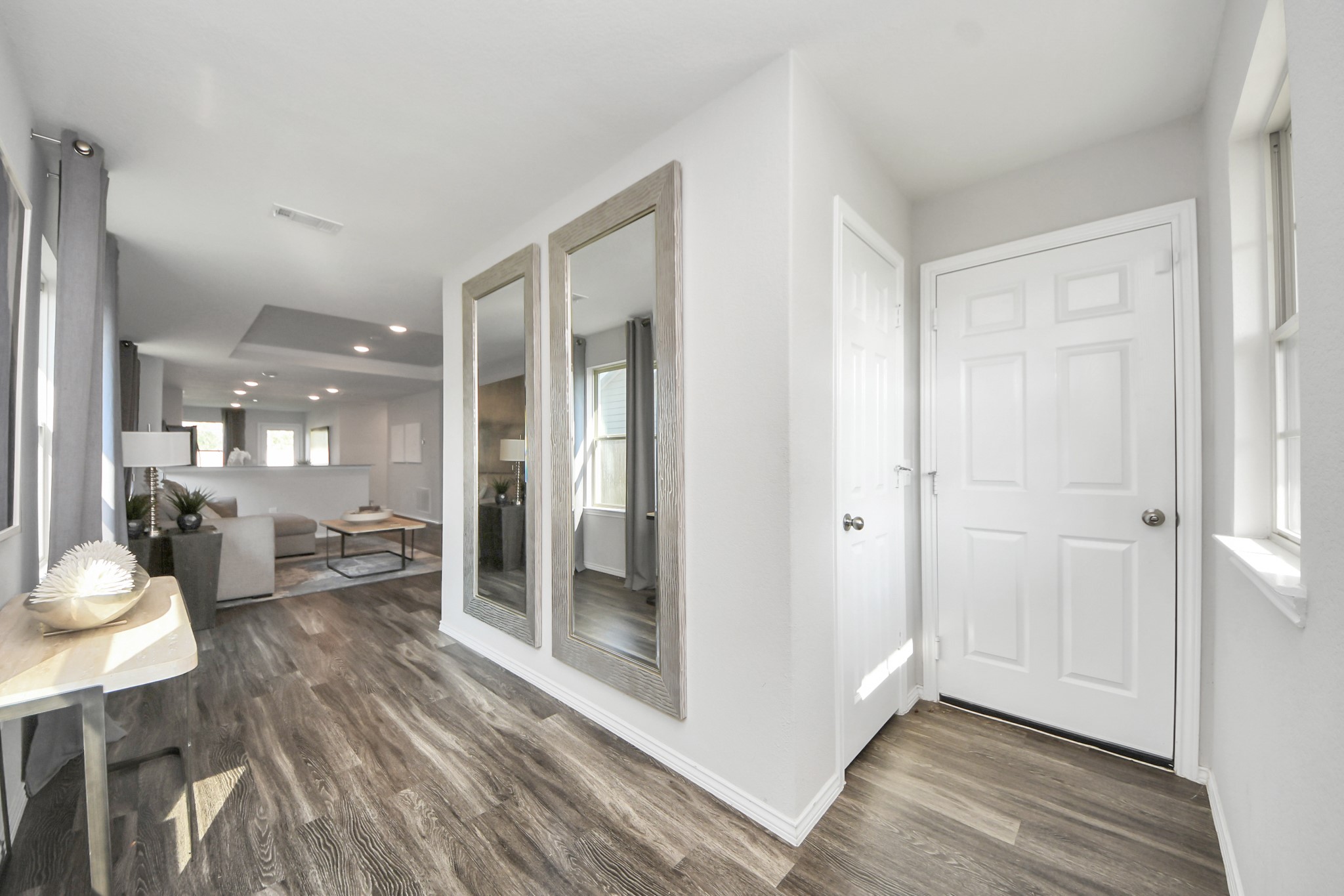 5735 Prairie Chapel Road Katy, TX 77493 - Photo 4 of 19 a view of a hallway and dining room