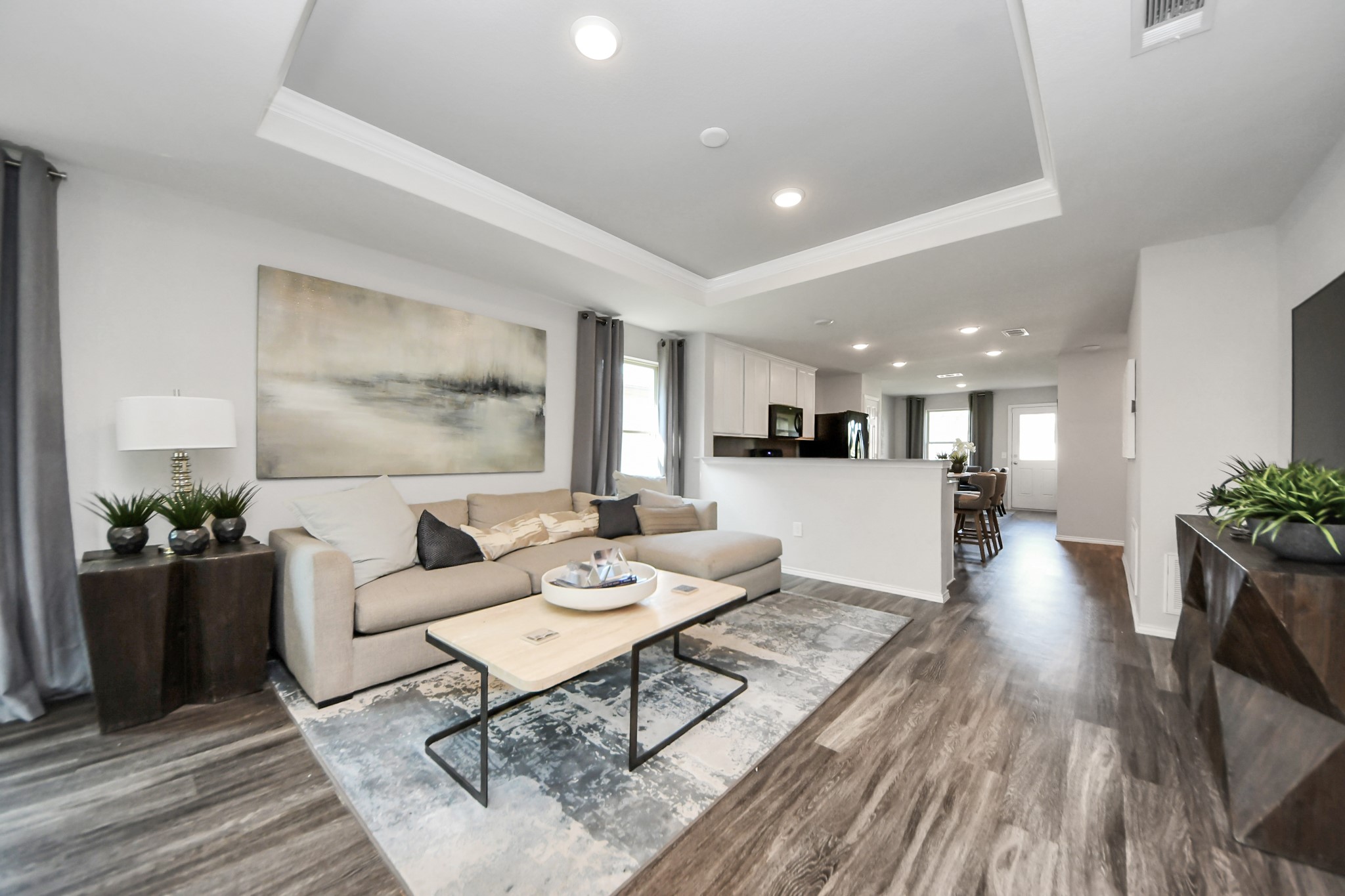 5735 Prairie Chapel Road Katy, TX 77493 - Photo 6 of 19 a living room with furniture and wooden floor