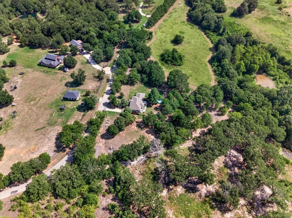 531 VZ County Road Eustace, TX 75124 - Photo 24 of 35 Expansive lot with multiple structures, surrounded by mature trees and natural landscaping