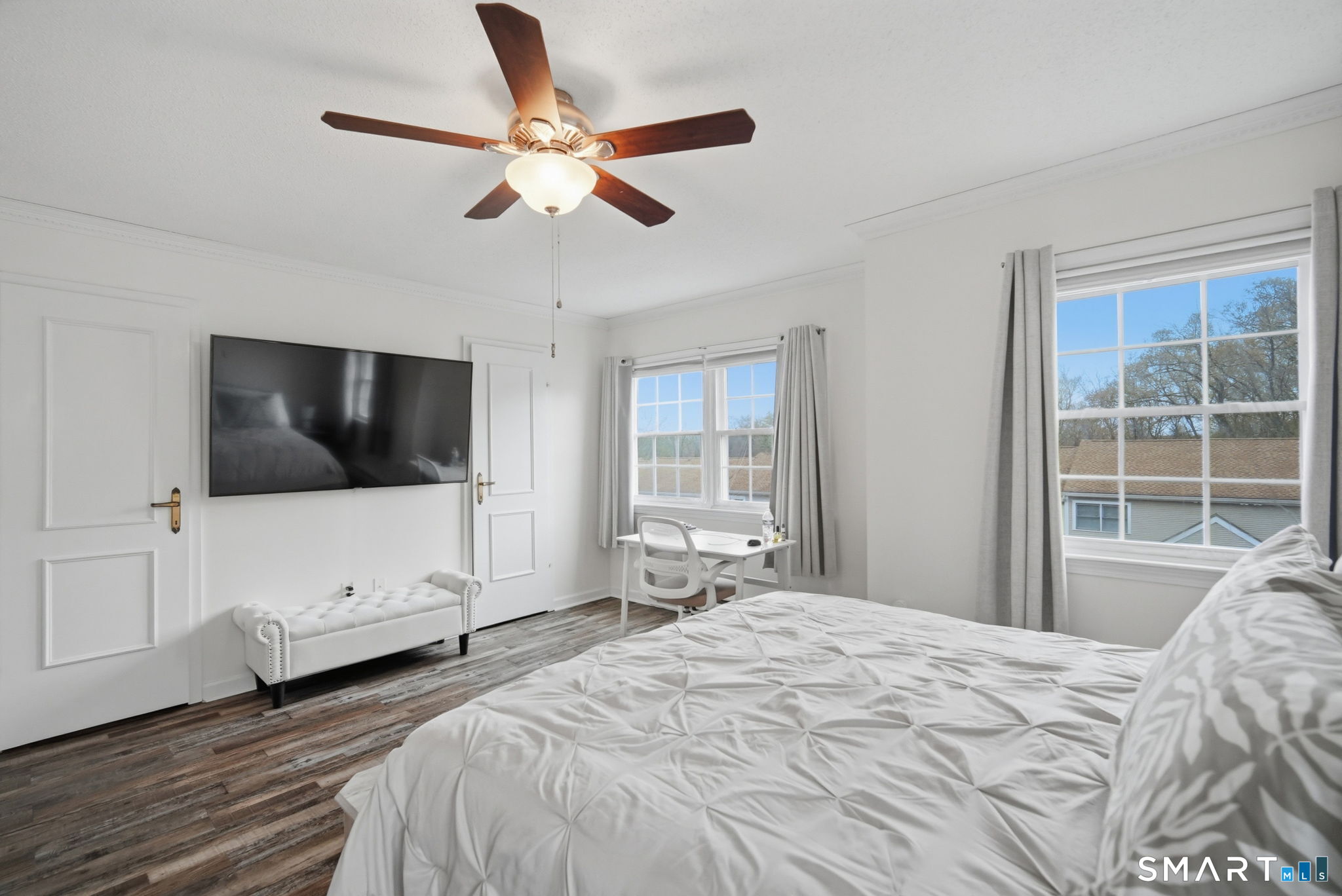 350 Bristol Street, Unit C12 Waterbury, CT 06708 - Photo 16 of 40 a bedroom with a large bed and a flat screen tv