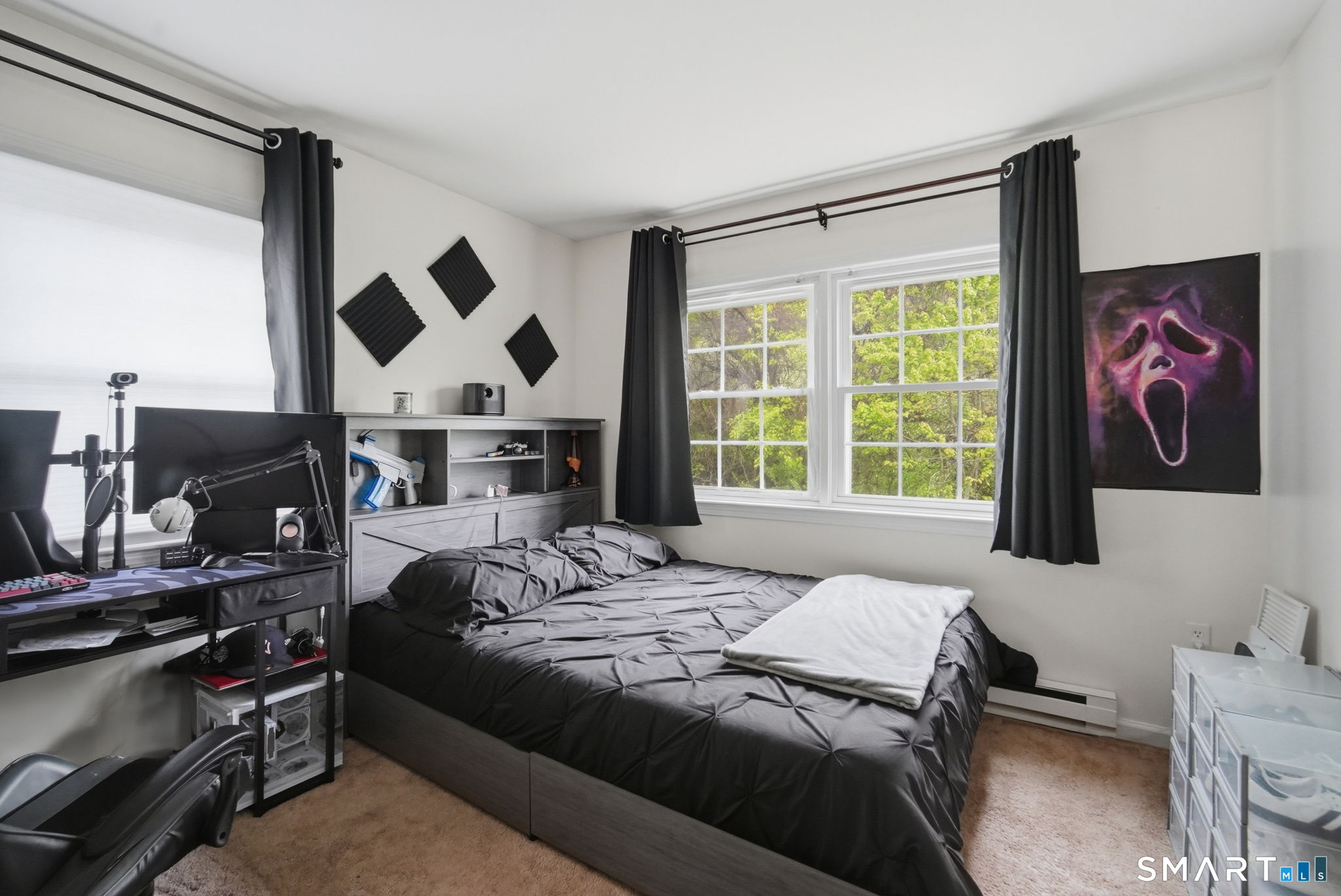 350 Bristol Street, Unit C12 Waterbury, CT 06708 - Photo 24 of 40 a bedroom with a bed and a window