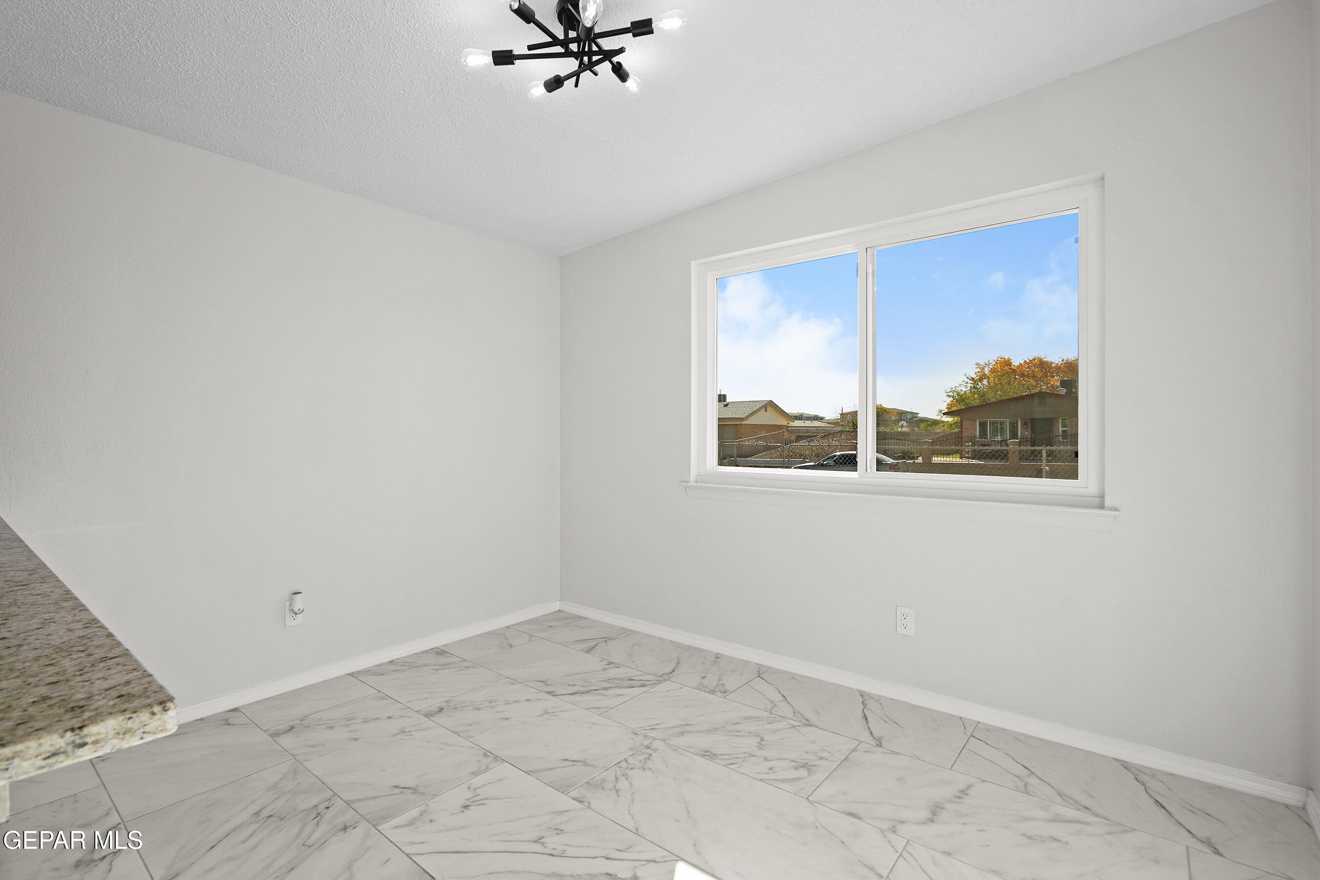 219 Caribe Circle El Paso, TX 79927 - Photo 20 of 43 a view of an empty room with a window