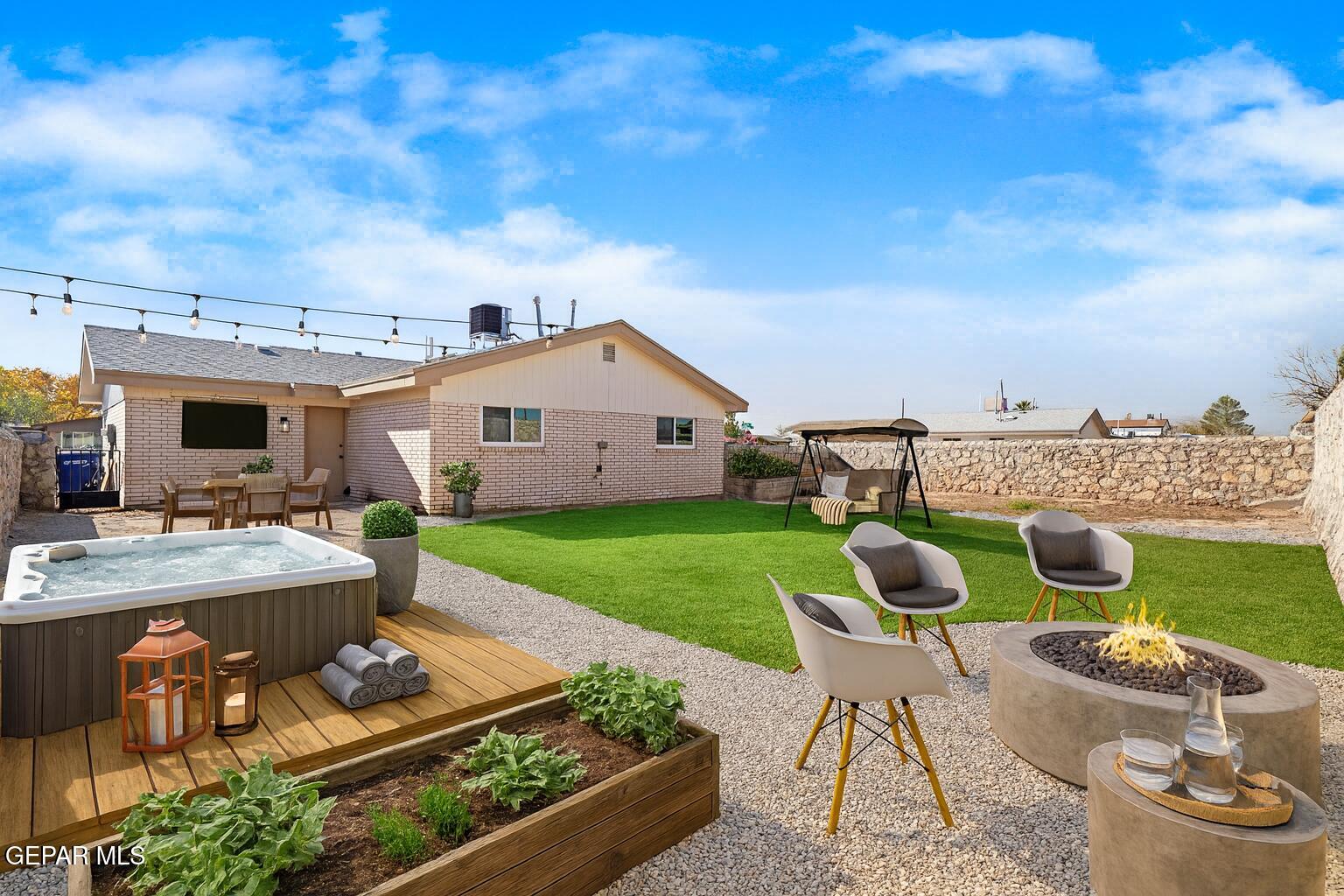 219 Caribe Circle El Paso, TX 79927 - Photo 32 of 43 a view of a patio with table and chairs with a barbeque grill and plants