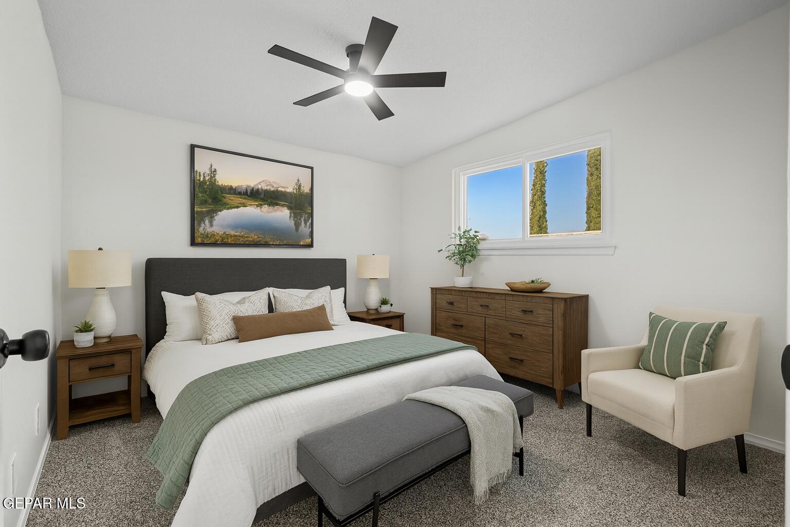 219 Caribe Circle El Paso, TX 79927 - Photo 5 of 43 a bedroom with a bed and a couch