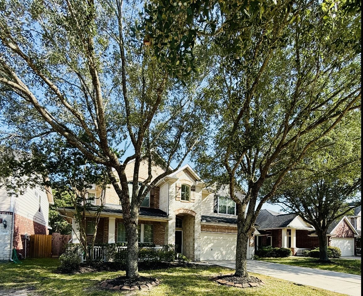 3114 Double Jack Court Spring, TX 77373 - Photo 32 of 42 a front view of a house with a garden