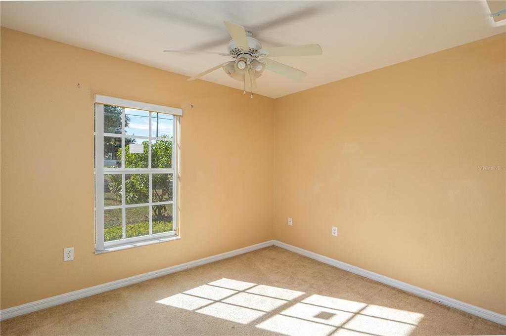 403 Southeast 3rd Street Fort Meade, FL 33841 - Photo 16 of 30 an empty room with a window