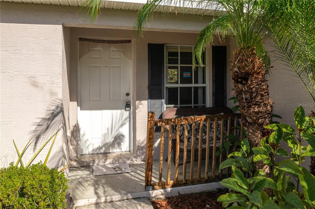 403 Southeast 3rd Street Fort Meade, FL 33841 - Photo 3 of 30 a view of a house with a window and garden