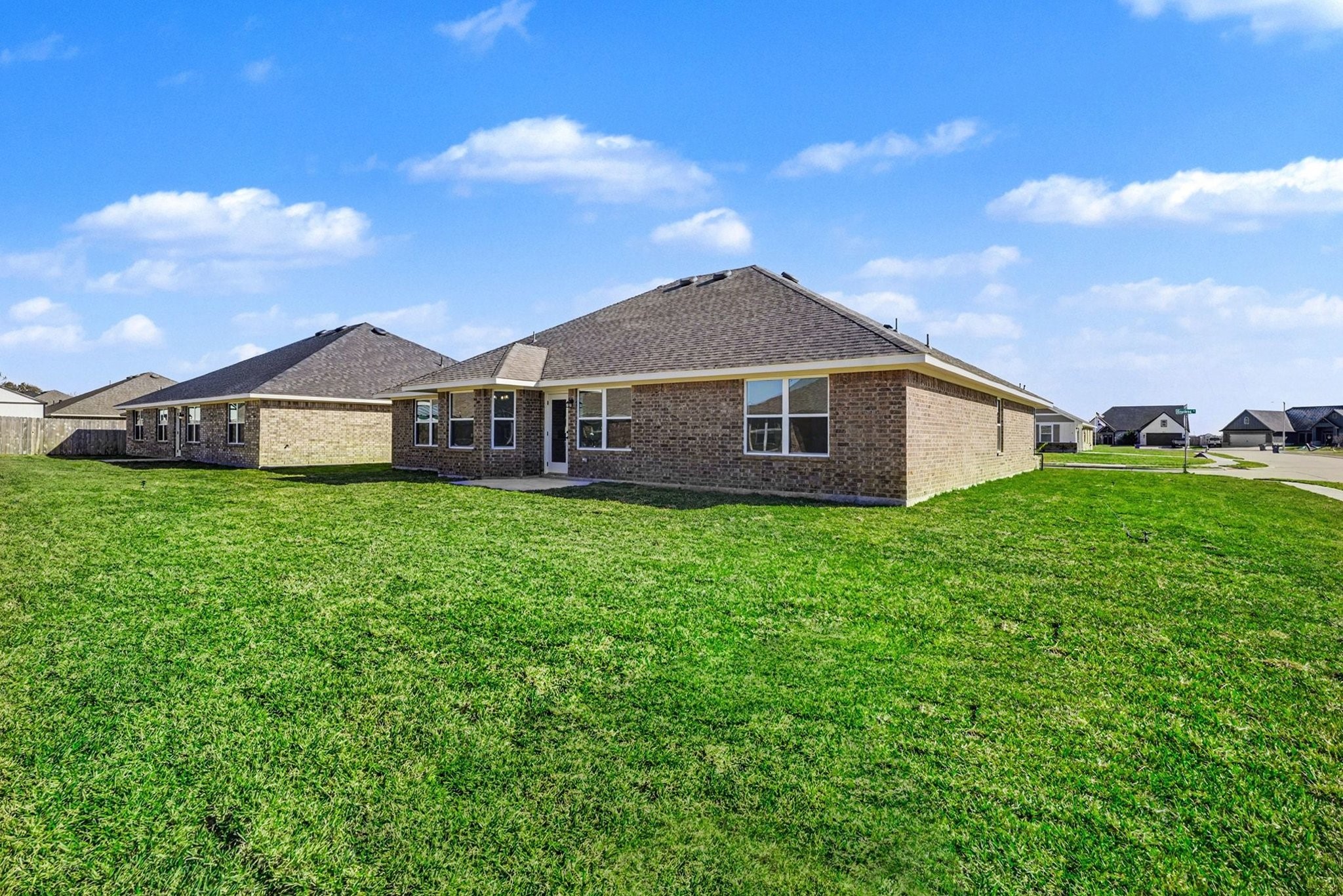 1 Keystone Court Angleton, TX 77515 - Photo 25 of 26 a front view of a house with garden